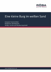 Eine kleine Burg im weißen Sand