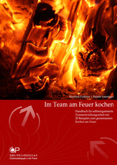 Im Team am Feuer kochen